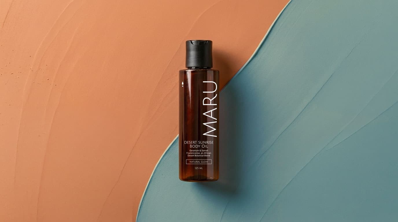 Maru Desert Sunrise body oil in warm morning light