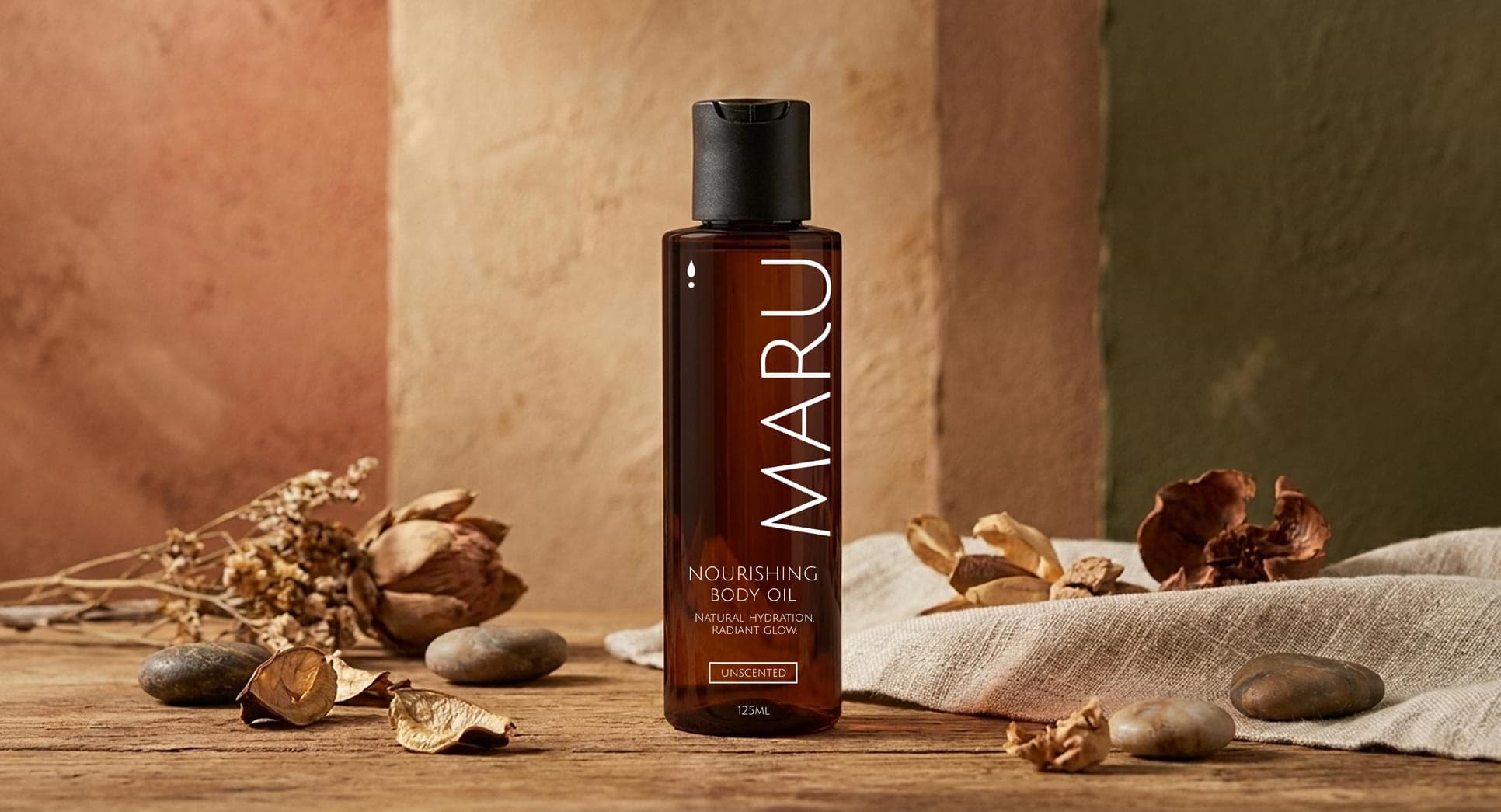 Maru body oil bottle on a soft background, designed for melanin-rich skin
